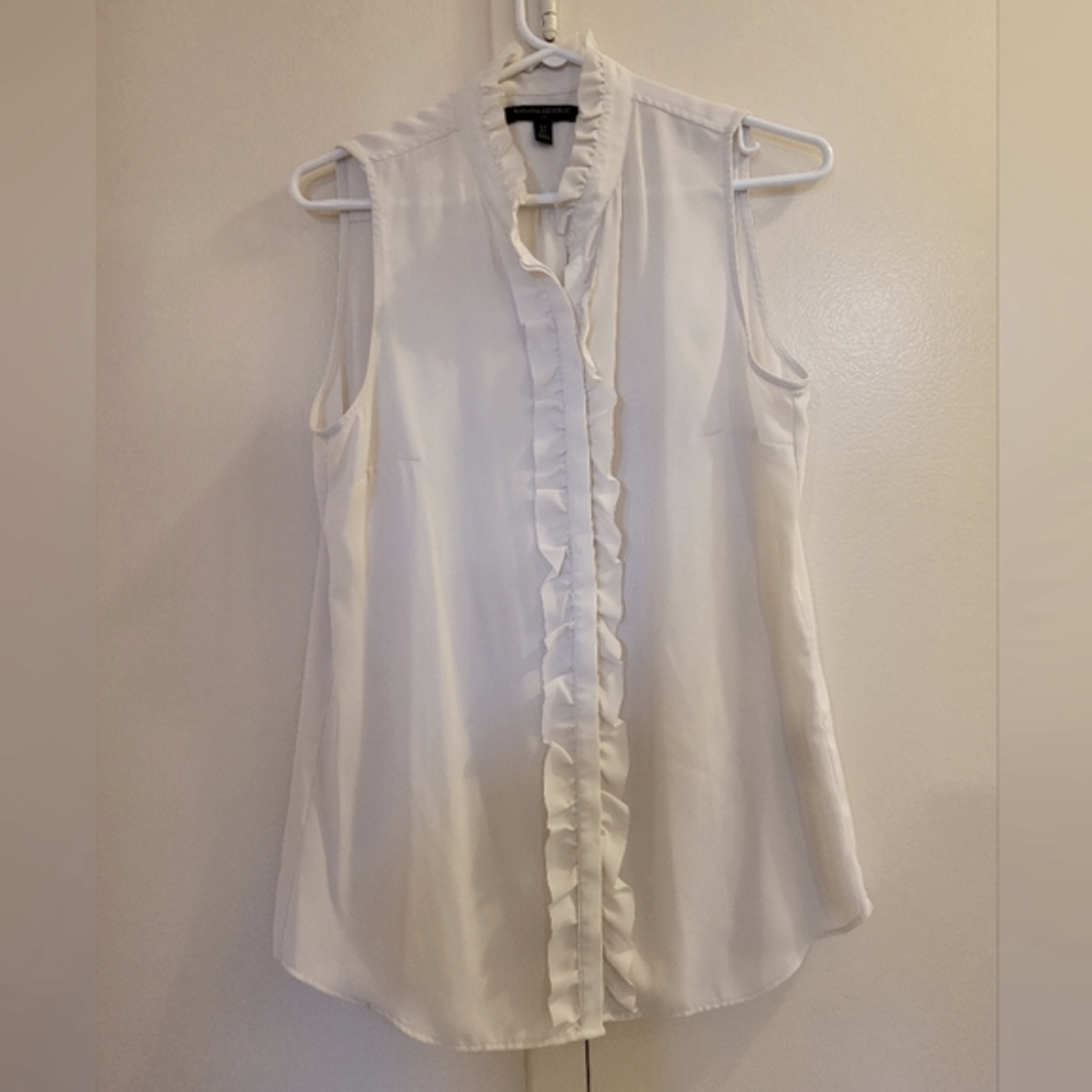 Frilled sleeveless blouse